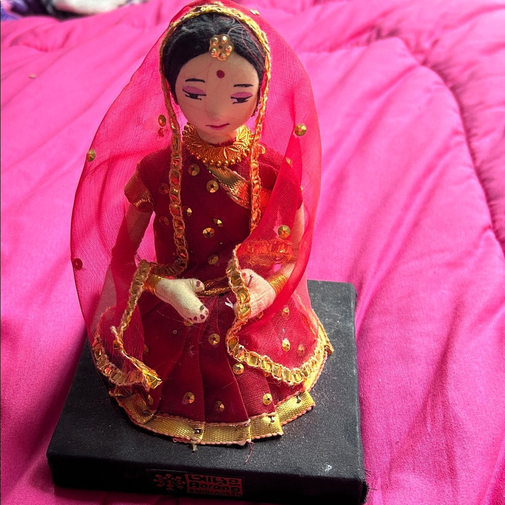 Traditional Red and Gold Doll